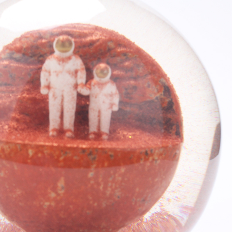 Astronauts snow globe