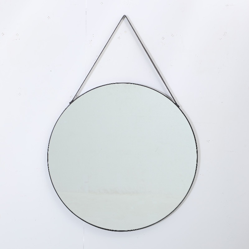 Round shaped wall mirror with leather strap