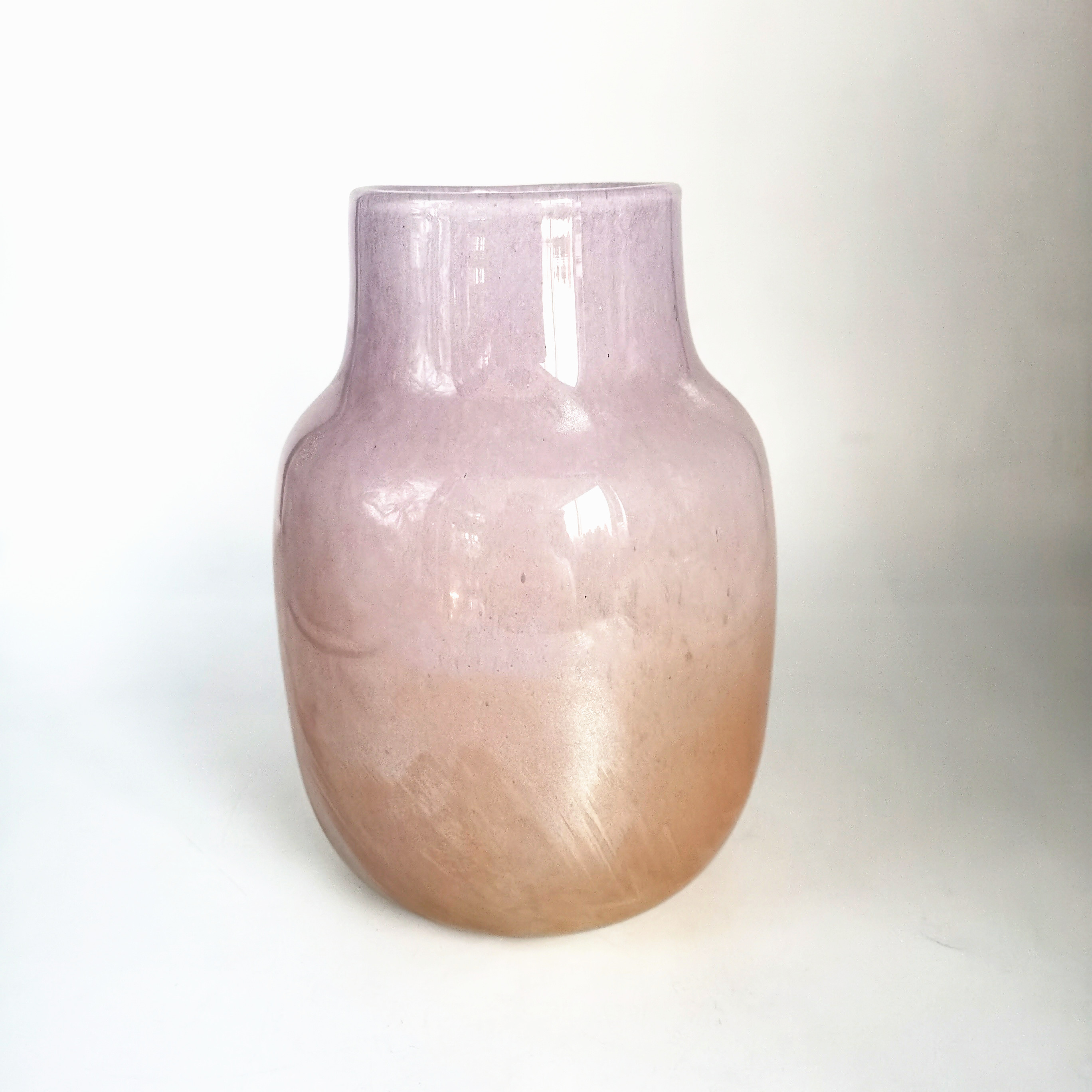 Hand made pink colored iridescent decorative glass vase