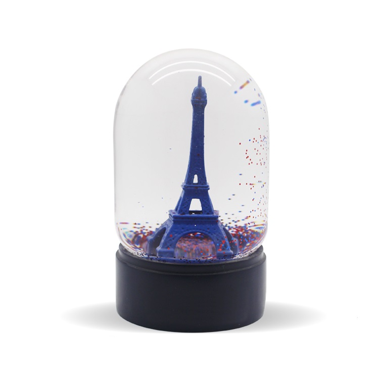 Blue eiffel tower snow globe