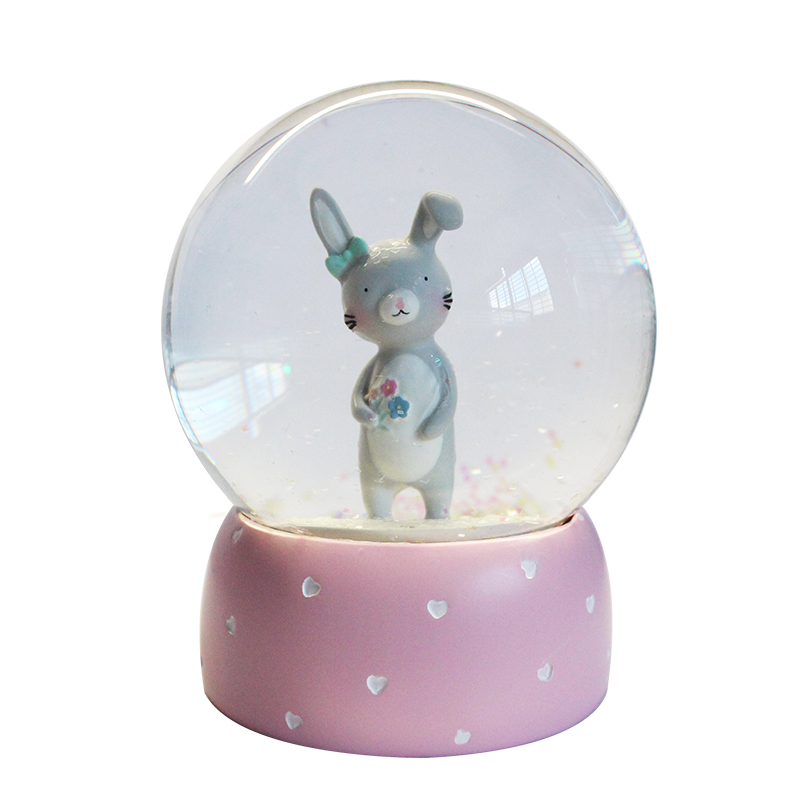 Cartoon rabbit snow globe