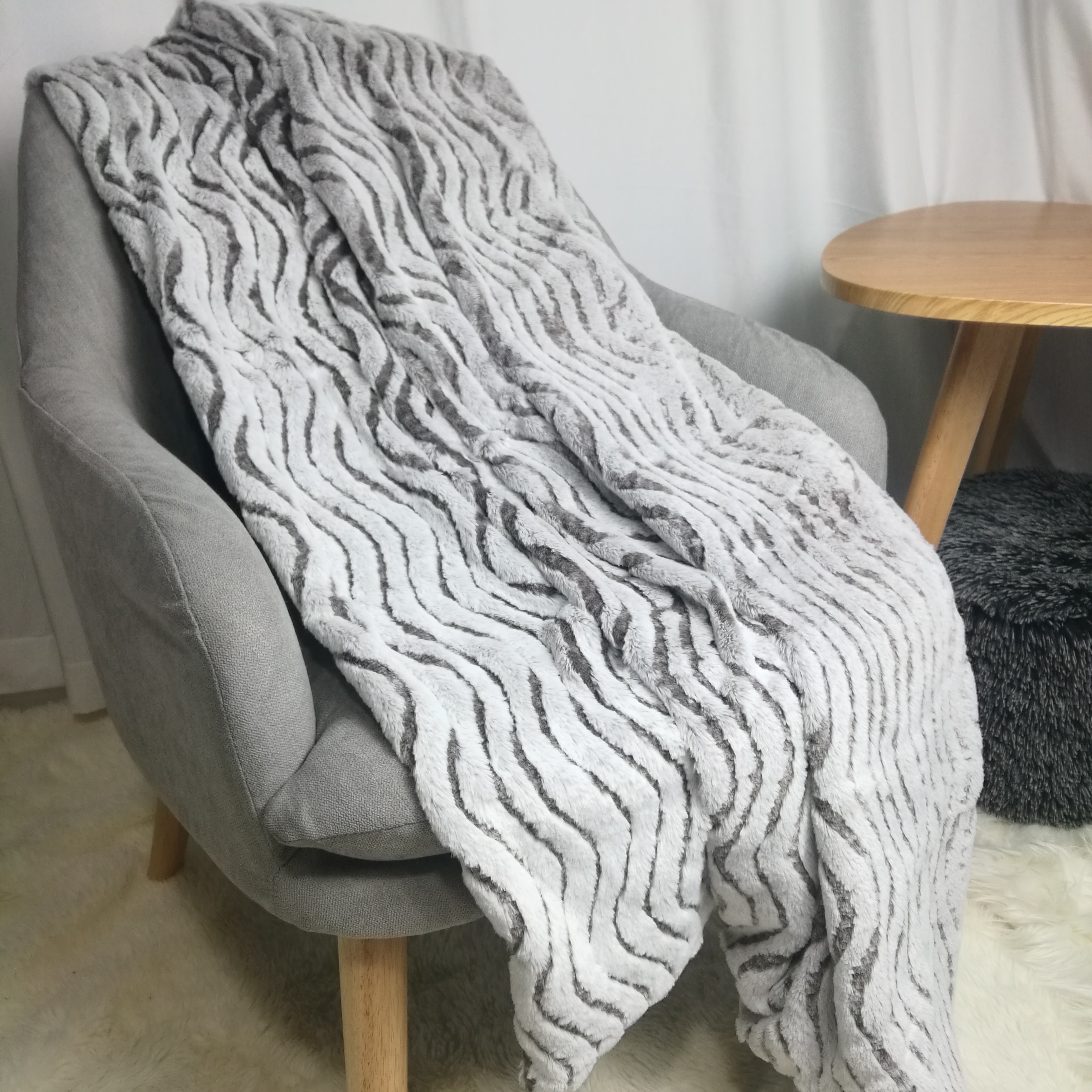 Burned-out fake rabbit fur blanket