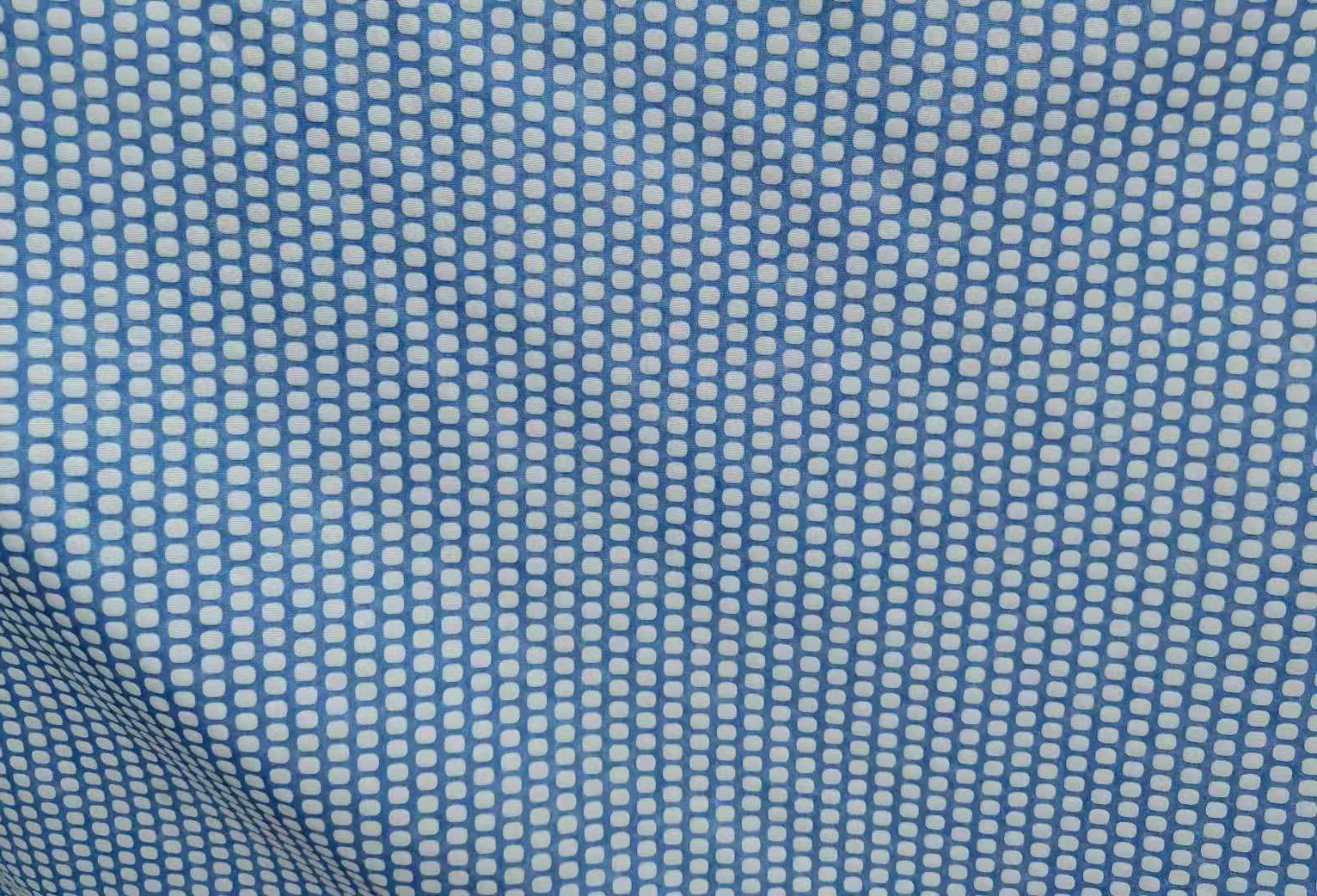 Printed embossed polyester fabric