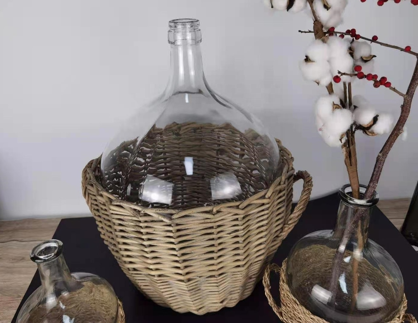 huge glass bottle vase with rattan wrapped basket