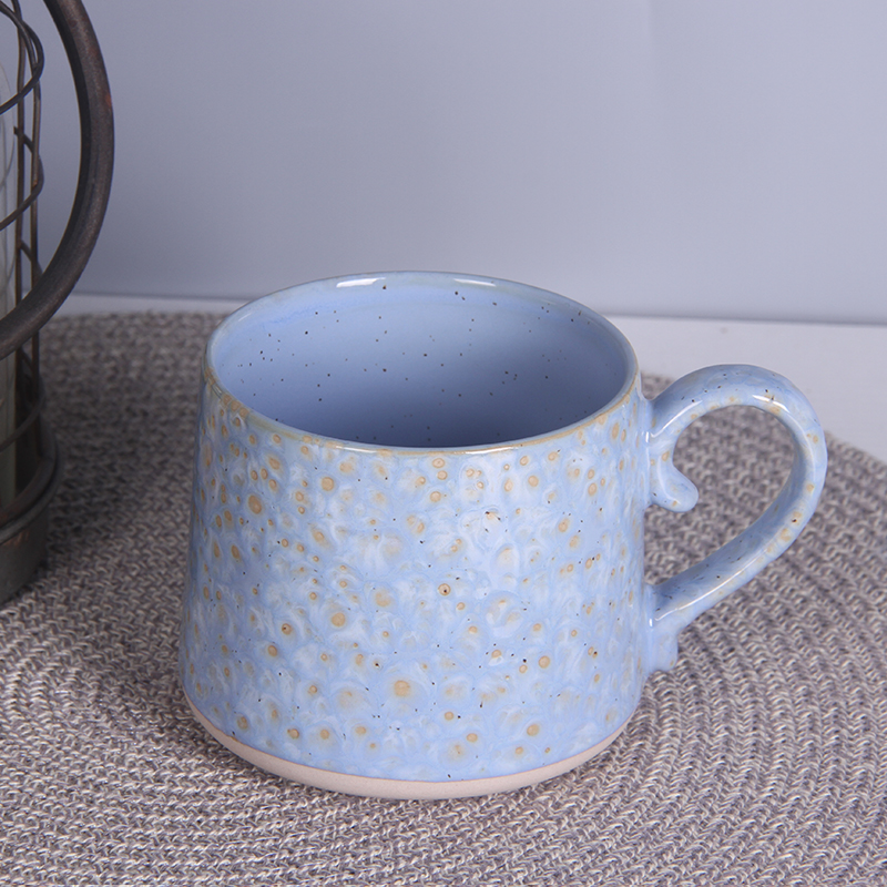 Embossed stoneware mug