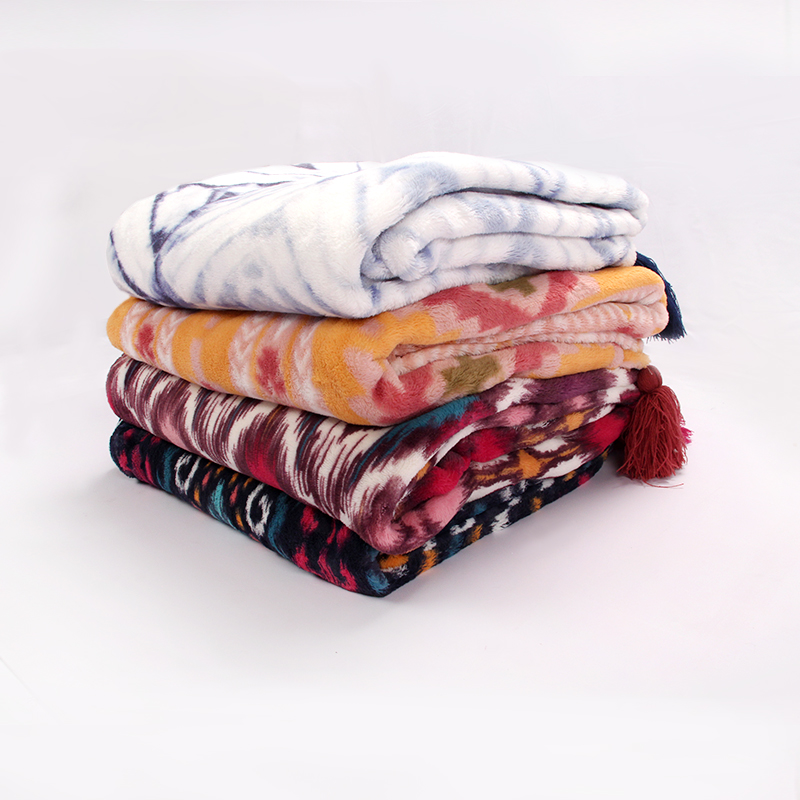 Full dull printed flannel throw with braid