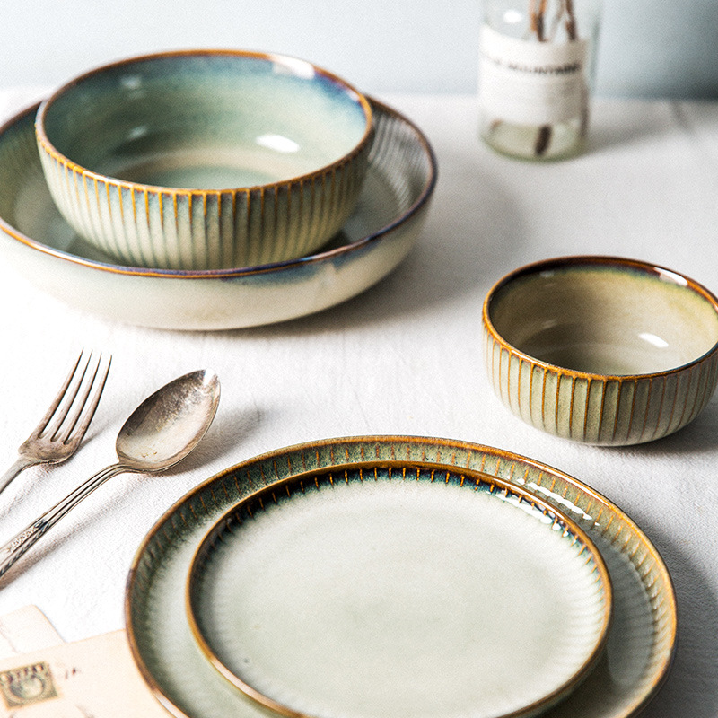 Creative reactive glaze yellow 2 tone ceramic 16 pc embossed dinnerware sets dishes plates and bowls