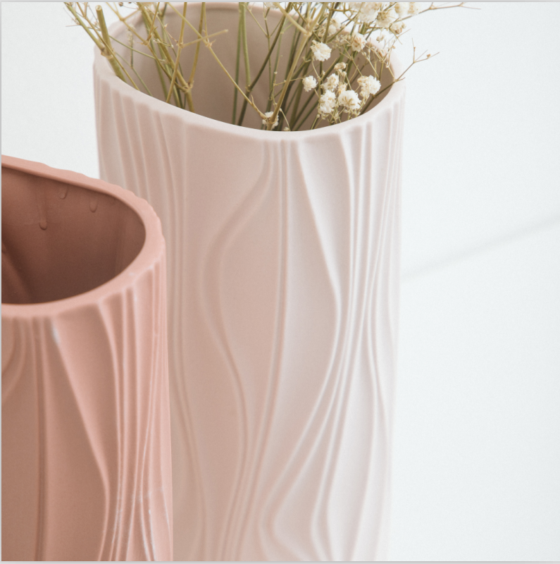 Wavy vases, candle cups