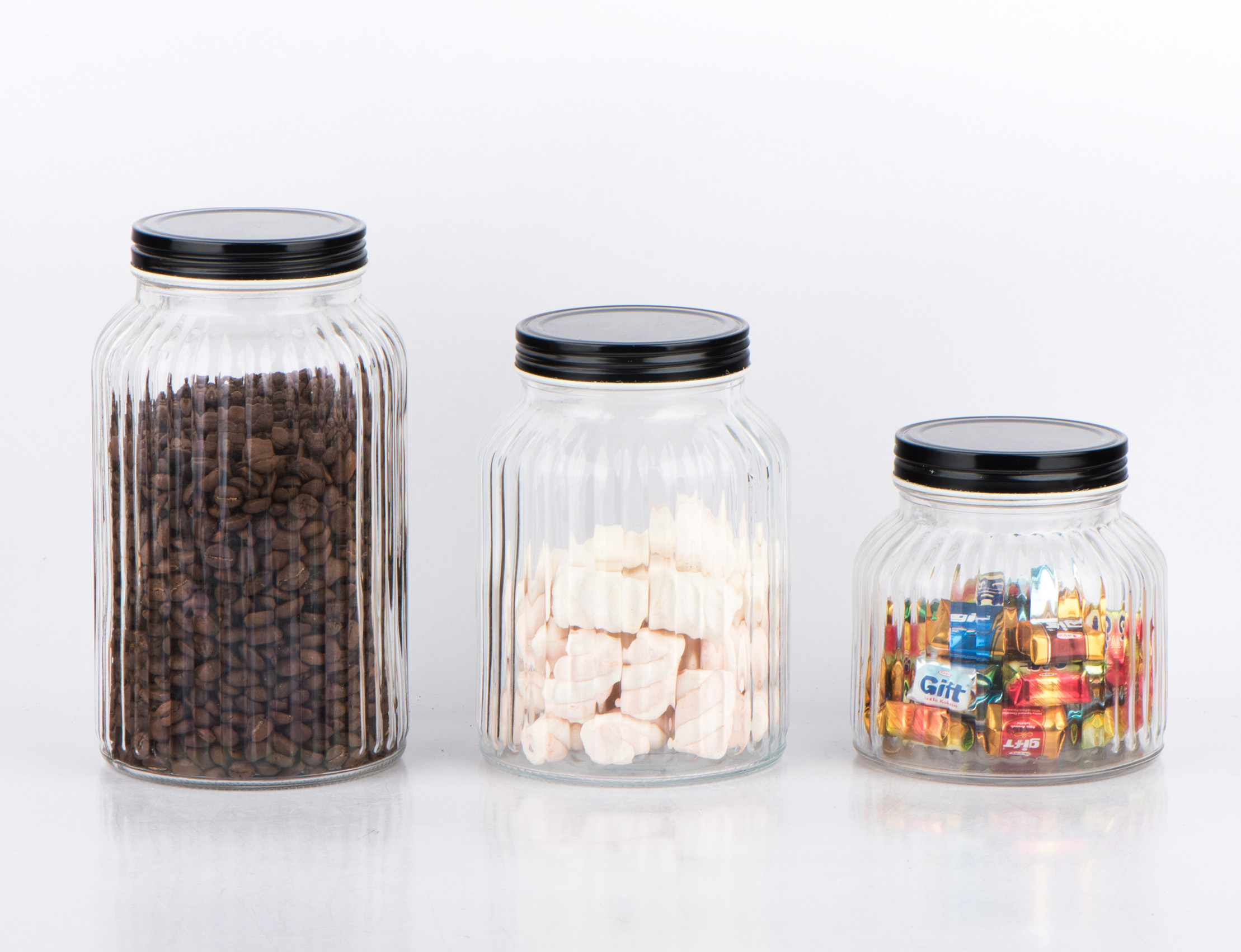 Glass candy jar with screw metal lid