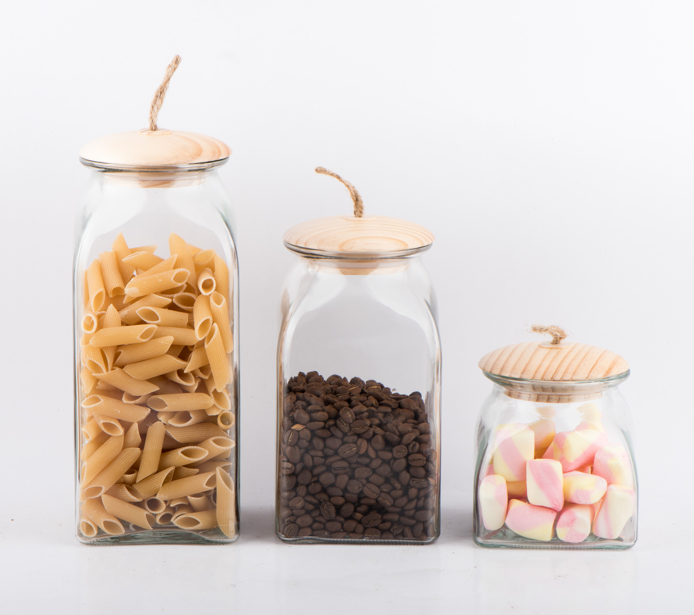 Clear glass food jar with wooden lid