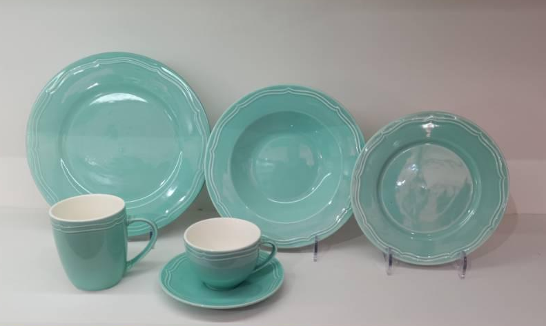 white porcelain with embossment + pigmented glaze