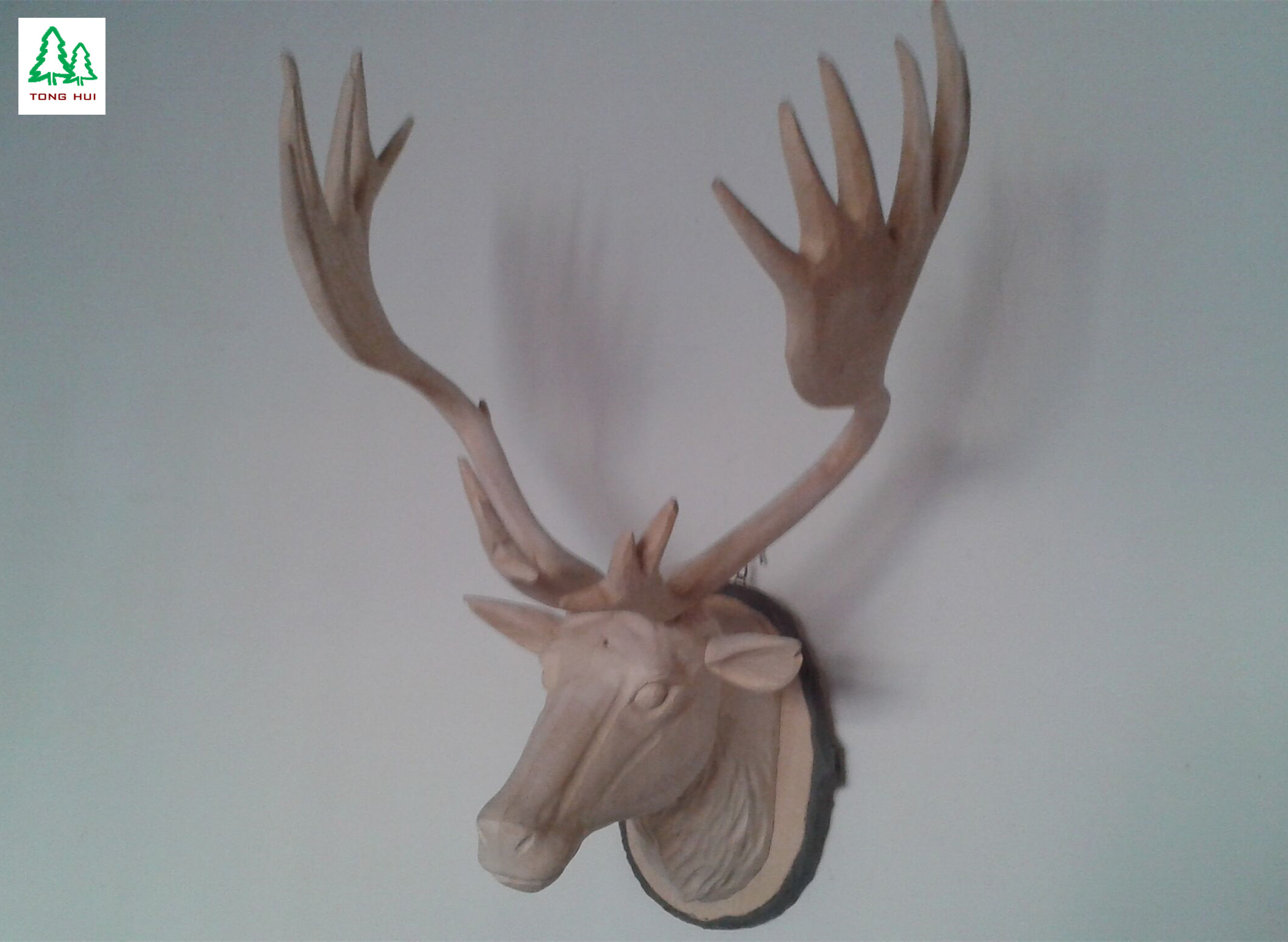 Wood carved animal head