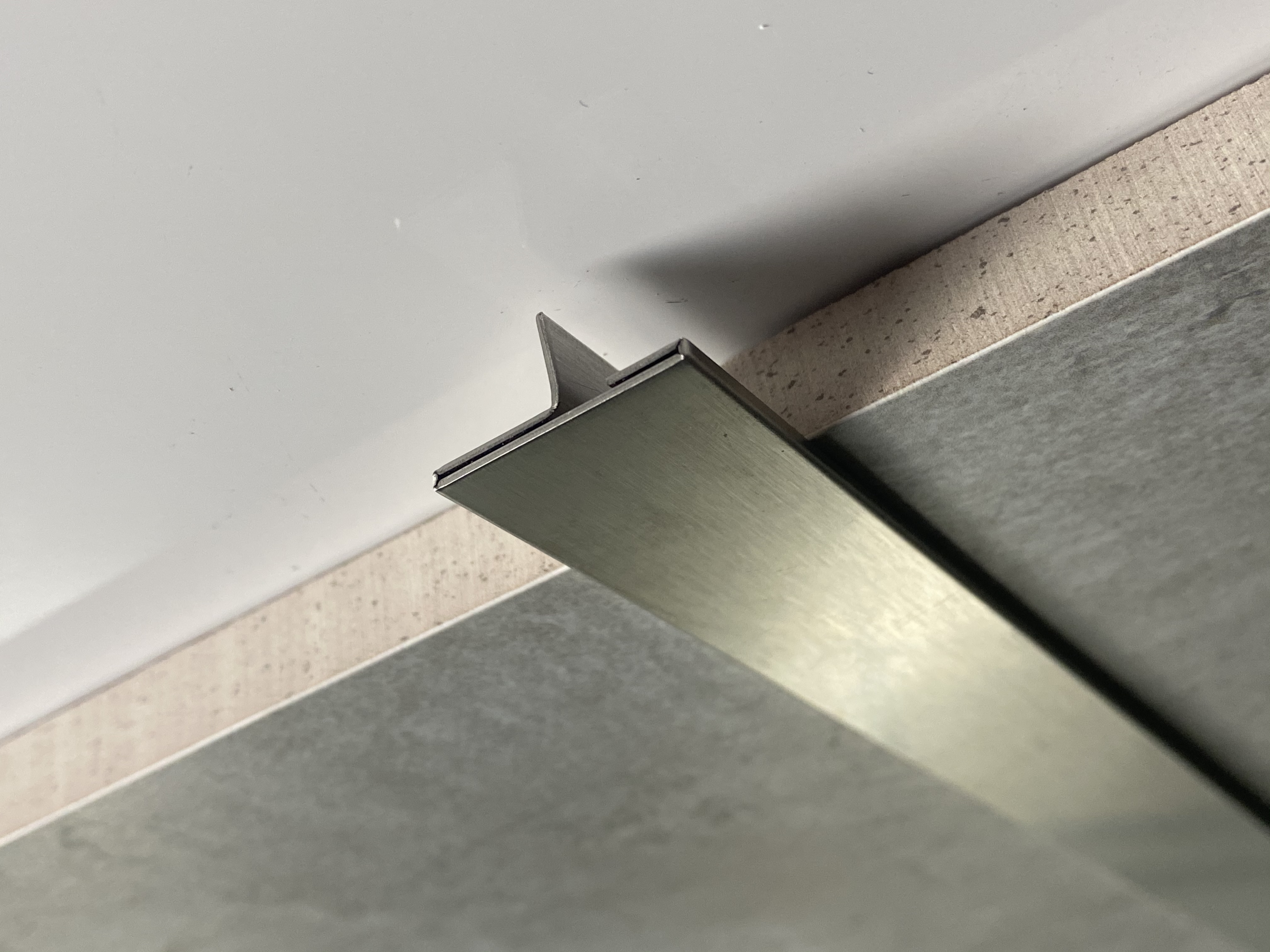 Stainless steel floor batten door edge strip
